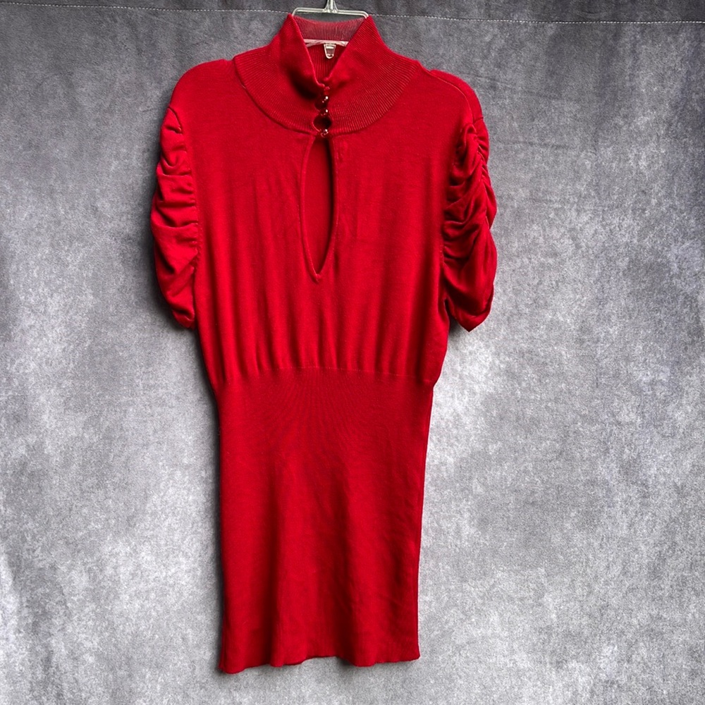 Women's tops. With a high collar and an interesting neckline